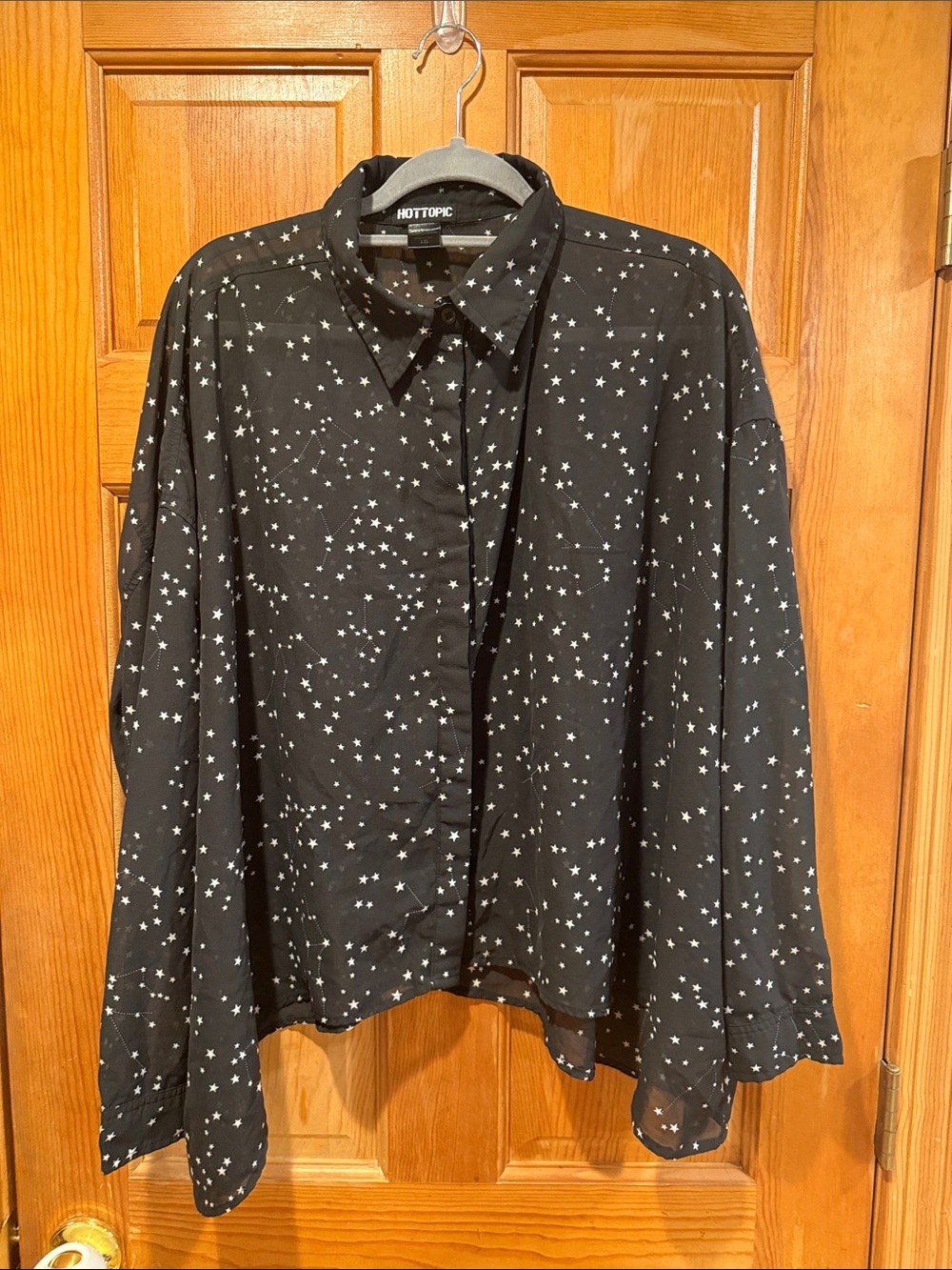 Hot topic sheer button down black with stars blouse size large .